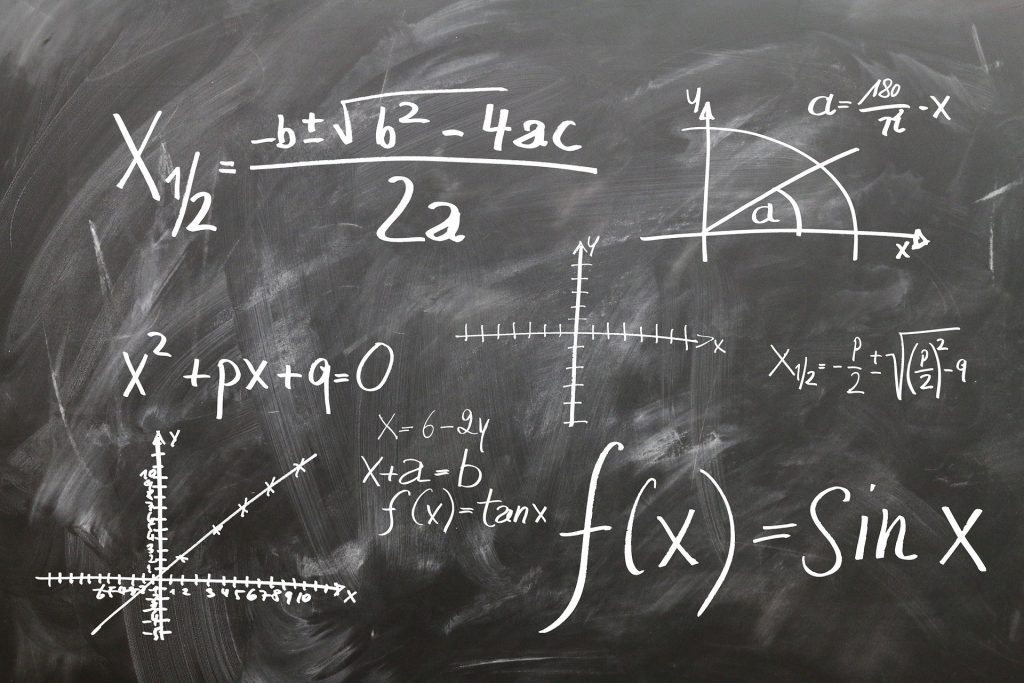 Linear algebraic equations written on a black board