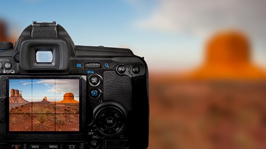 A camera taking a picture of a desert.