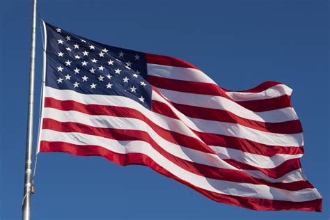 An American flag waving in the wind.